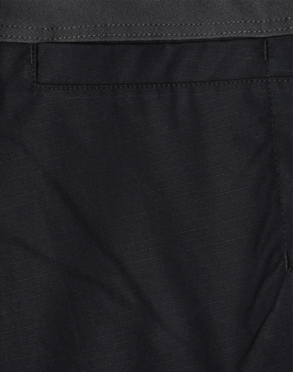Black rip-stop poly/cotton stretch work pants with a subtle textured pattern and a pocket detail.