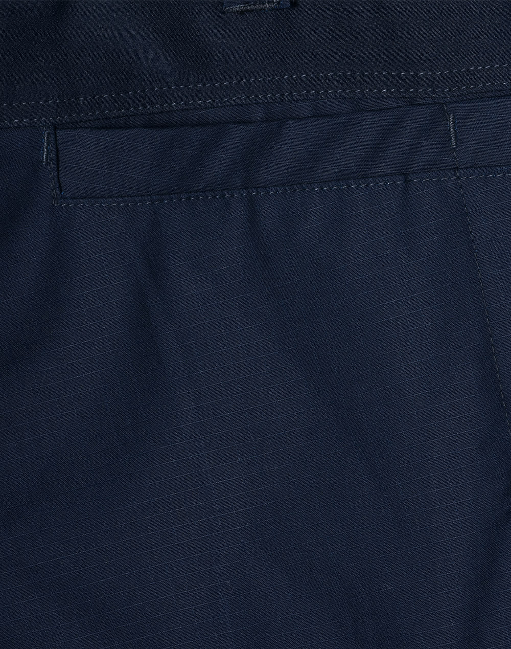 Navy rip-stop poly/cotton stretch work pants with a smooth fabric texture and a branding logo.