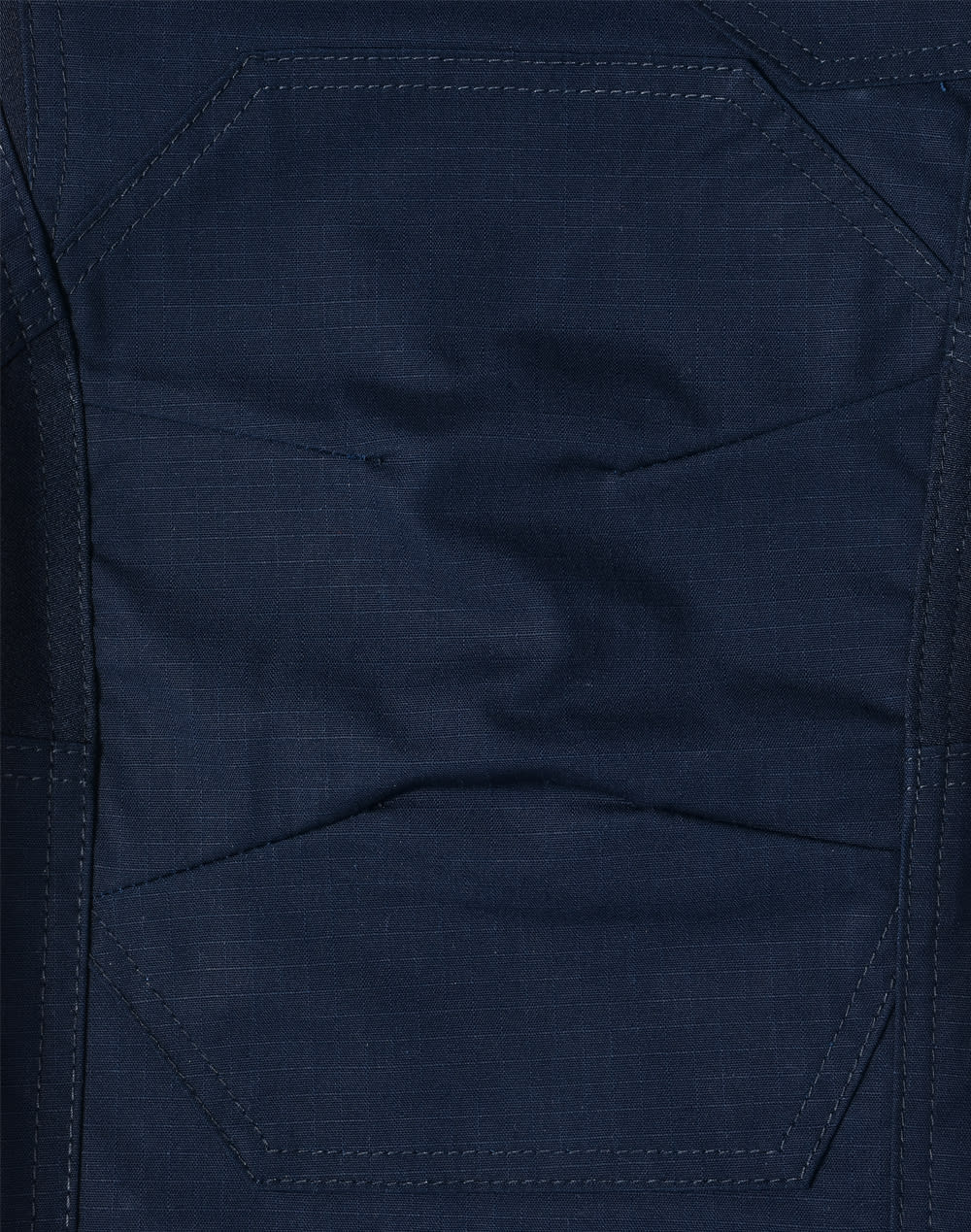 A close-up of dark navy rip-stop poly/cotton stretch work pants, featuring textured fabric and detailed stitching.