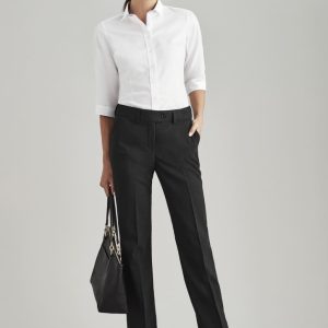 Women's black stretch pants with adjustable waist, paired with a white shirt and black handbag for a polished look.
