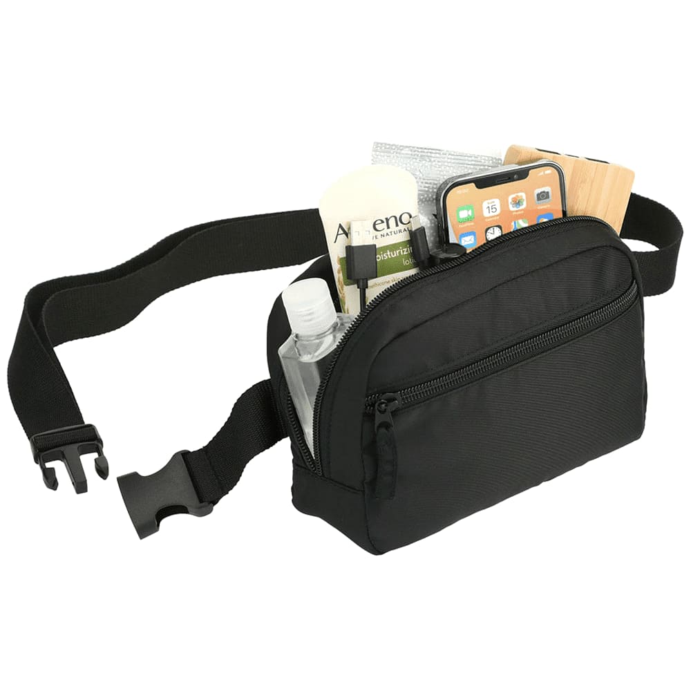 A light beige bum bag with a logo, featuring multiple zippered compartments and an adjustable strap.