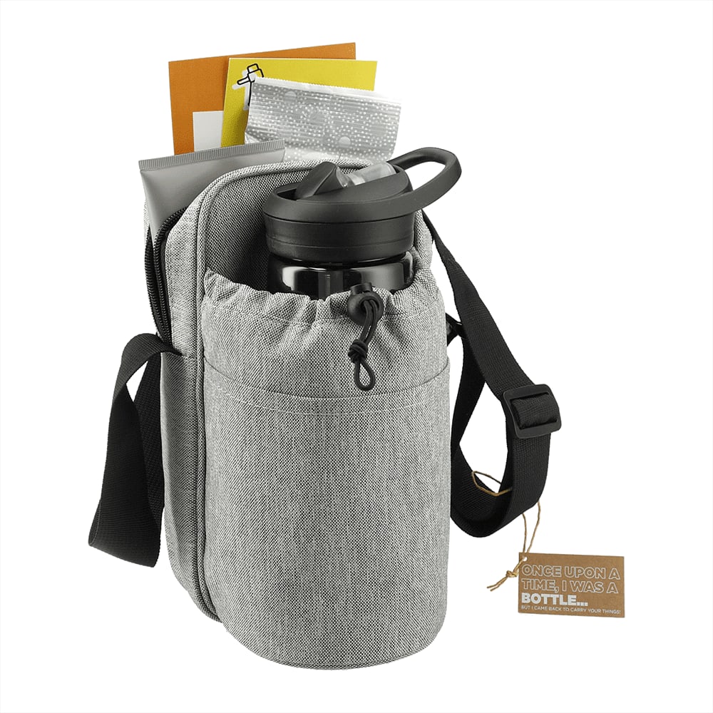 A drink bottle in a grey adjustable sling cooler bag with a pouch, alongside other items like notebooks and a snack.
