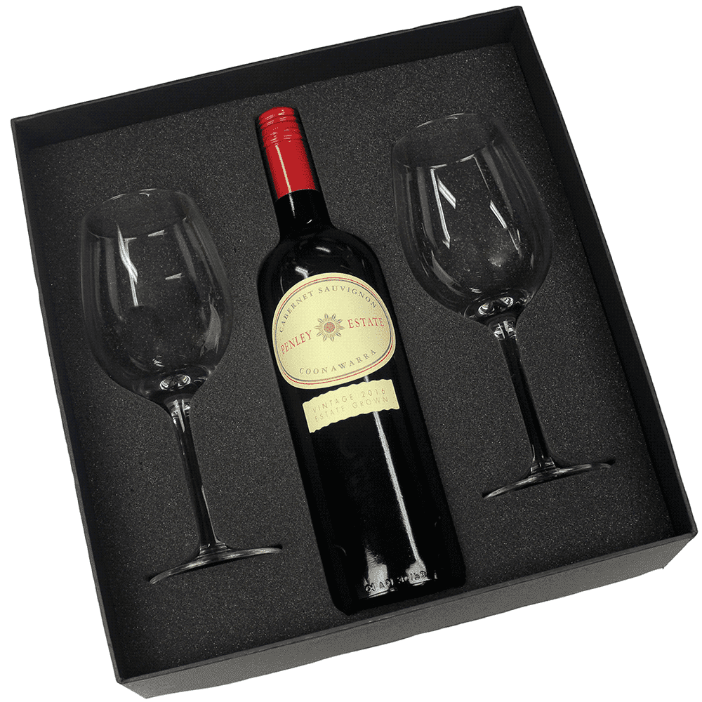 A wine box featuring a red wine bottle and two clear wine glasses, all in a black cushioned packaging.