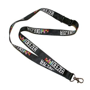 A black lanyard with a logo, featuring dye sublimation printed designs in a repeating pattern.