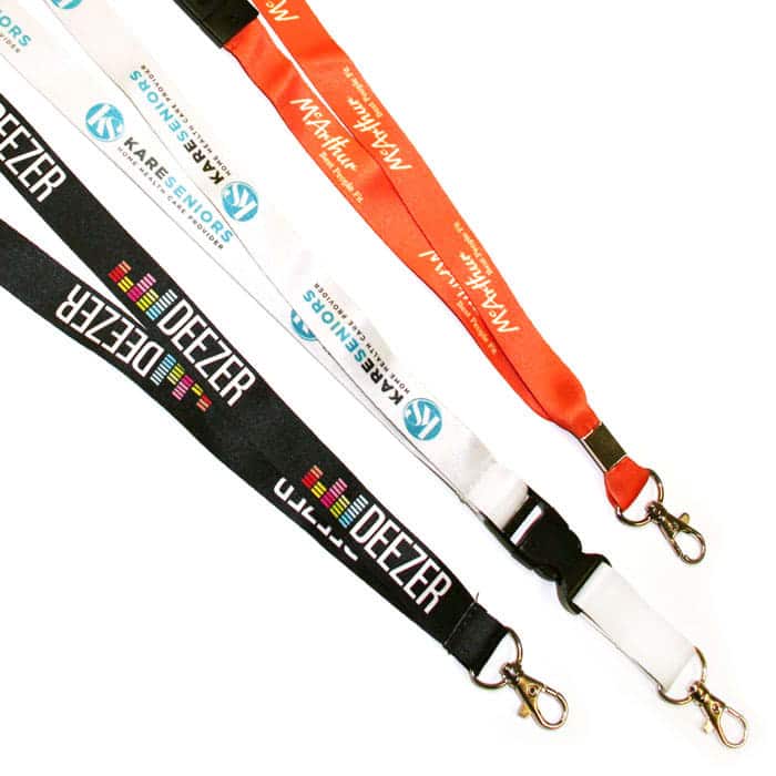 A selection of lanyards in black, white, and vibrant colours, featuring logos and clips.