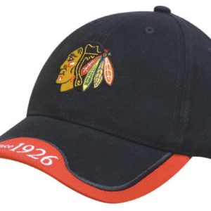 A black cap with a peak indent and embroidered trim, featuring a logo on the front and red detailing on the brim.