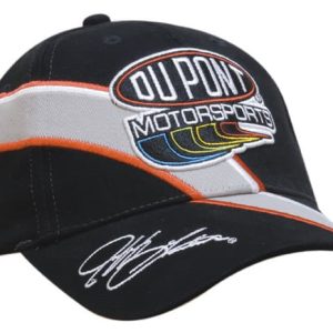 A black brushed cotton cap with embroidered trim and inserts, featuring a logo and signed detailing.