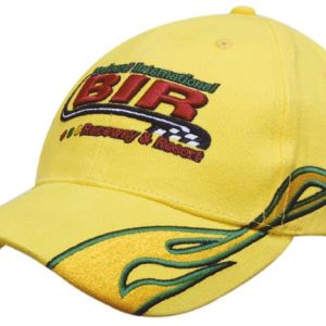 A yellow cap featuring flame embroidery on the peak and side, with a logo on the front.