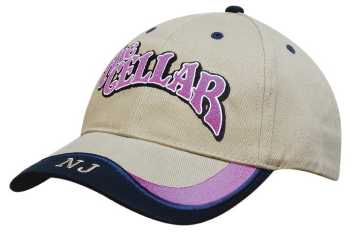 A beige cotton cap with a peak indent, featuring embroidered text and a navy blue underside. It has a logo on the side.