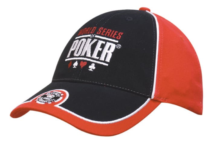 A black and red cap featuring a logo and piping detail, designed with a peak indent.