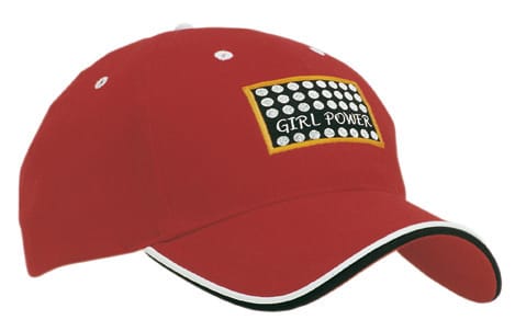 A red cap with double peak trim features a logo and contrasting accents, showcasing a sporty design.