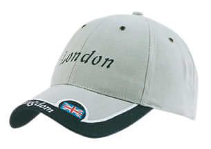 A beige cap with a trimmed peak insert, featuring a logo and the word 