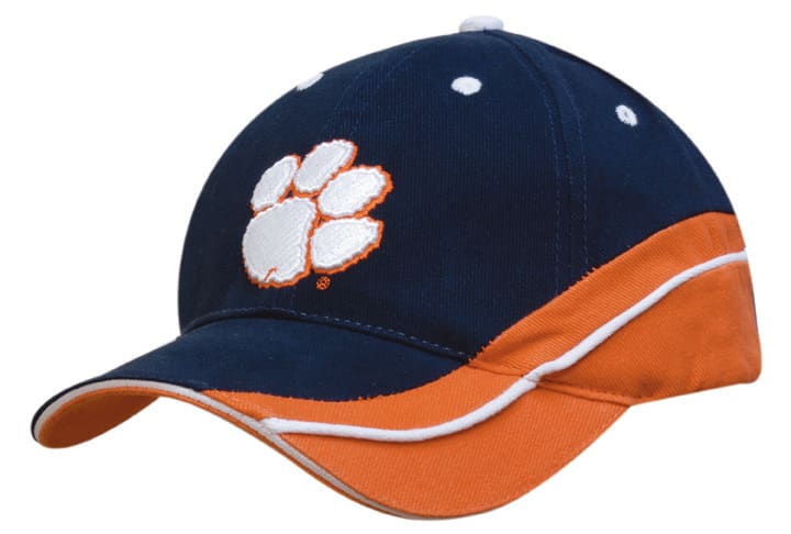 A navy cap with an orange peak and sandwich detail, featuring a logo on the front and white stitching.