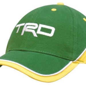 A green and yellow cap featuring contrasting panels and piping, with a logo on the front.