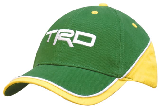A green and yellow cap featuring contrasting panels and piping, with a logo on the front.