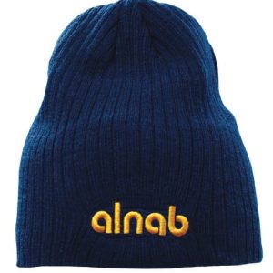 A navy blue cable knit beanie featuring a logo in yellow stitching.