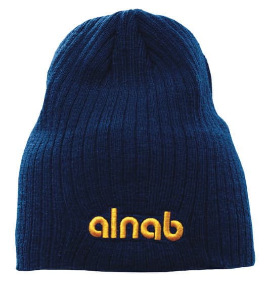 A navy blue cable knit beanie featuring a logo in yellow stitching.