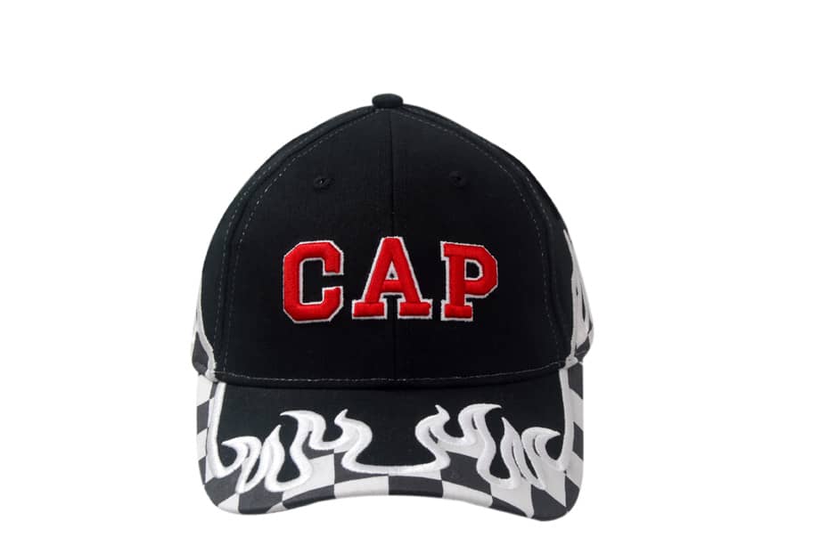 A black cap featuring printed checks and flame embroidery on the crown and peak, with a logo on the front.