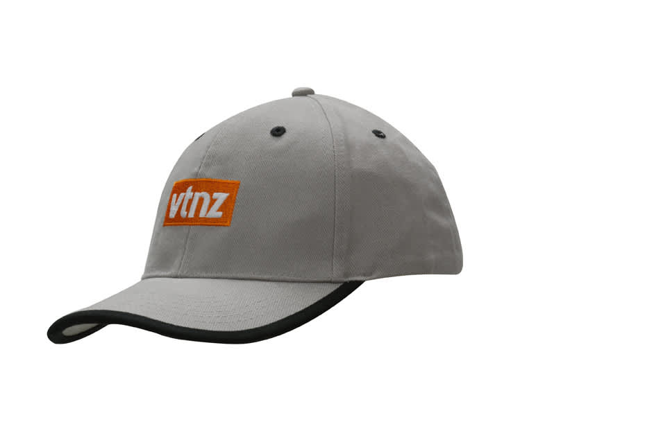 A grey cap with a peak trim and an orange logo on the front.