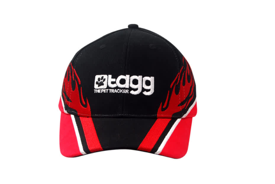 A black and red cap featuring an embroidered design on the peak and a logo on the front.