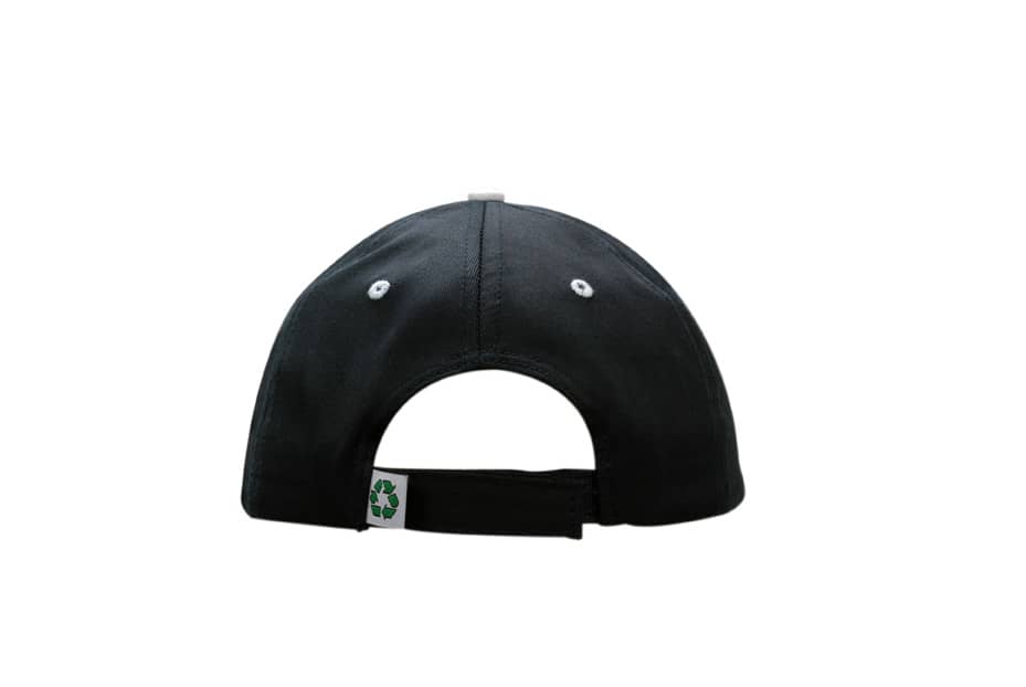 A black brushed heavy cotton cap featuring fabric inserts on the crown and peak, with a logo on the back.