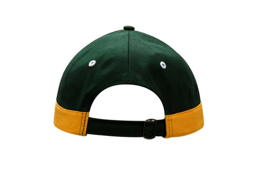 A green cap with a yellow trim on the peak and back, featuring a strap for adjustment.