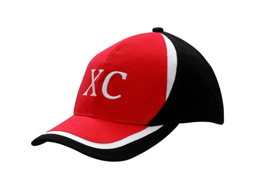A red and black brushed heavy cotton cap with crown and peak inserts, featuring a white logo.