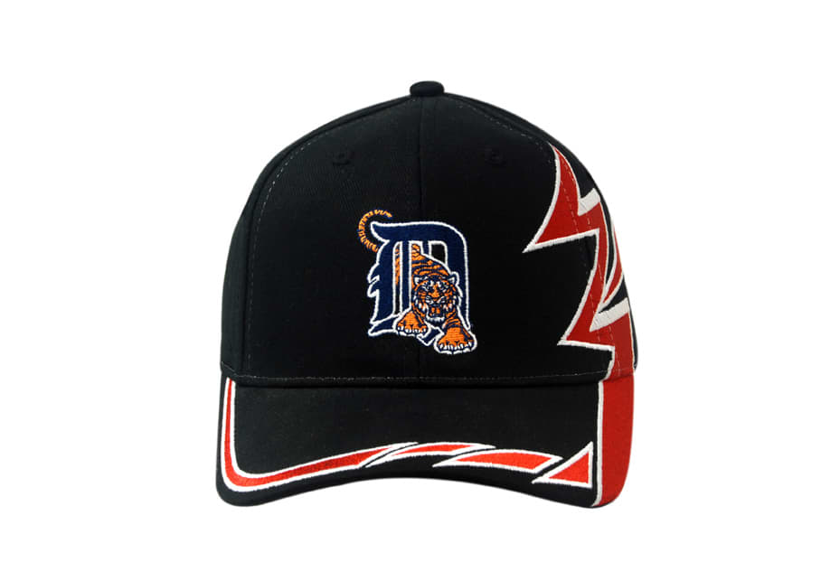 A black cap featuring slash embroidery in red and white on the crown and peak, with a logo on the front.