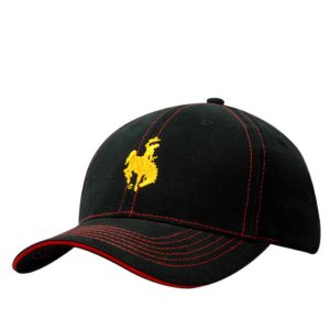 A black brushed cotton cap featuring yellow stitching and a logo, with a red sandwich trim on the peak.
