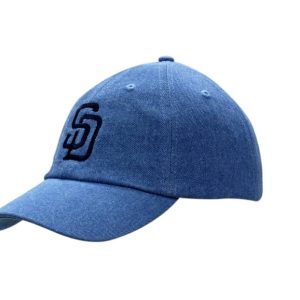 Washed denim cap in blue featuring a logo on the front. Designed for casual wear.