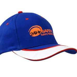 A blue cap with a white sandwich trim and peak indent, featuring an embroidered logo.