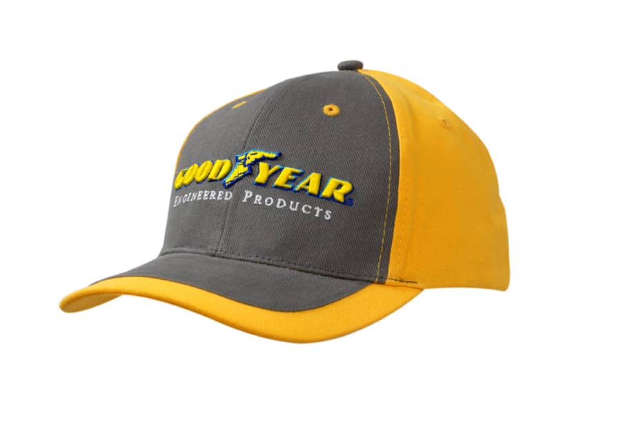 A grey and yellow Brushed Heavy Cotton Cap with a peak indent, featuring a logo on the front.