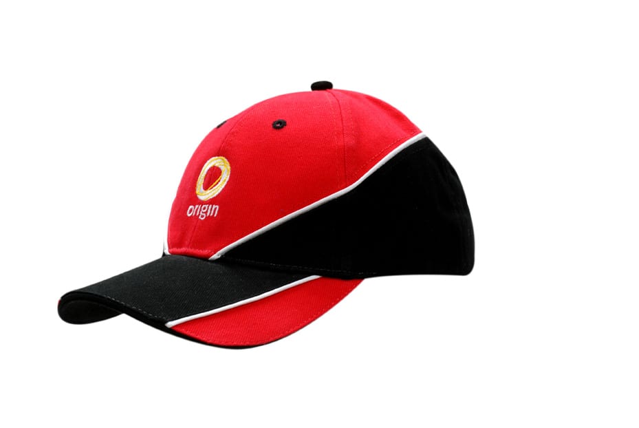 A red and black cap featuring fabric inserts and piping, with a logo on the front.