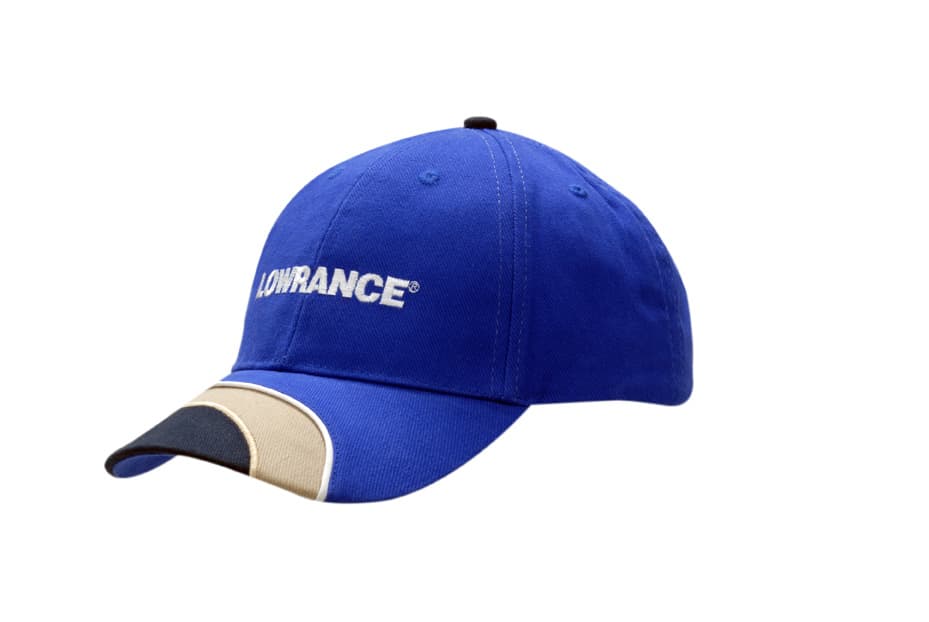 A blue cap with fabric inserts and piping on the crown and peak, featuring a logo.