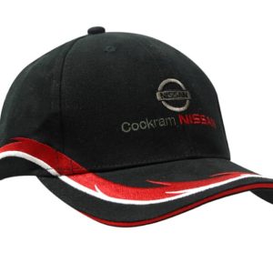A black cap with a red and white embroidered peak, featuring a logo and branding on the front.
