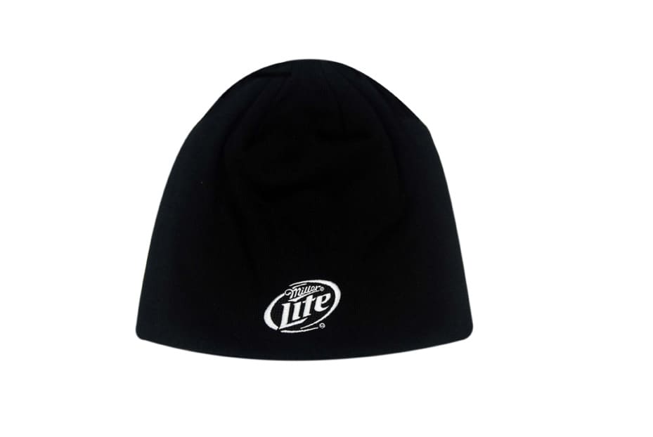 A black rolled down beanie made from 100% cotton, featuring a logo on the front.
