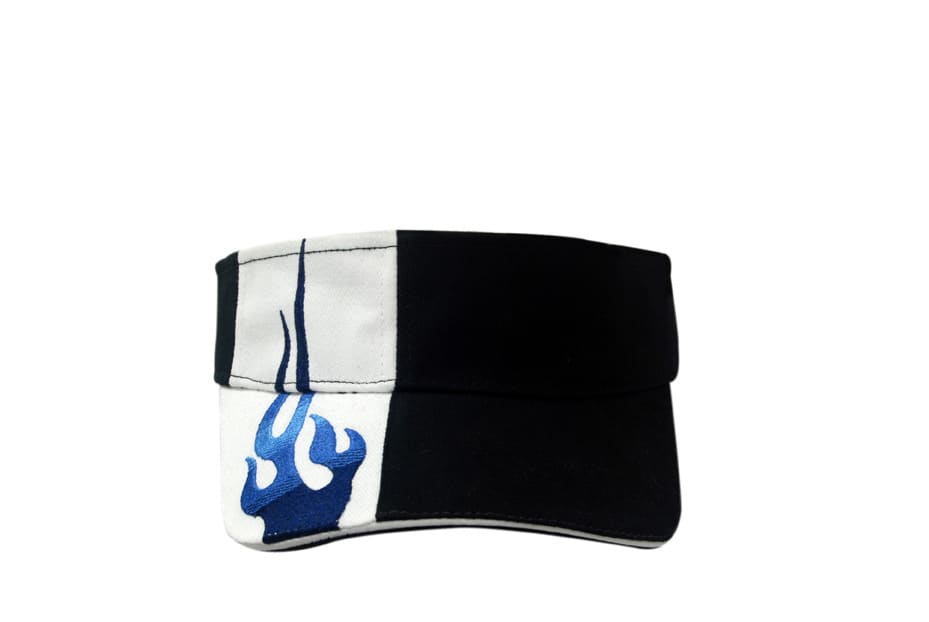 A black and white visor featuring flame embroidery in blue on the crown and peak, with a logo.
