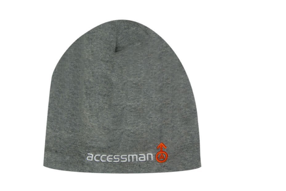 A grey rolled down beanie made of 100% cotton with fleece lining and a logo embroidered on the side.