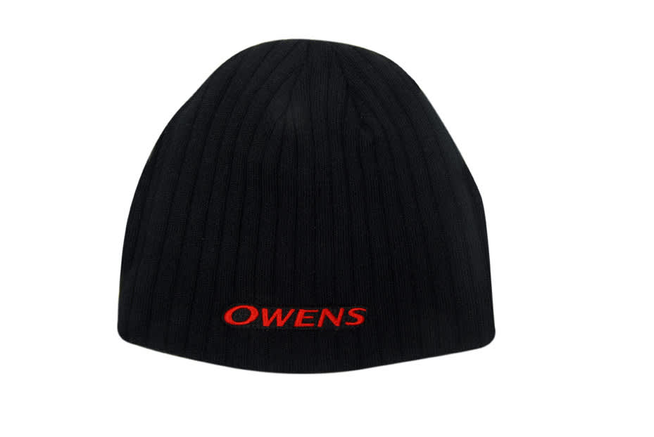 A black cable knit roll-down beanie with a logo in red. The beanie has a textured finish.