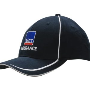 A navy cap featuring embroidered lines on the peak and piping on the crown, with a logo present.