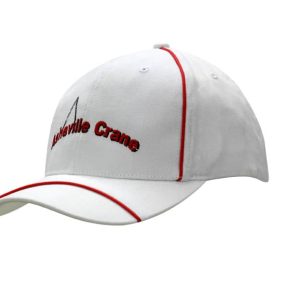 A white cap with red piping on the crown and peak, featuring a logo on the front.