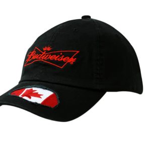 Black cap featuring a frayed applique on the peak and a logo on the front.