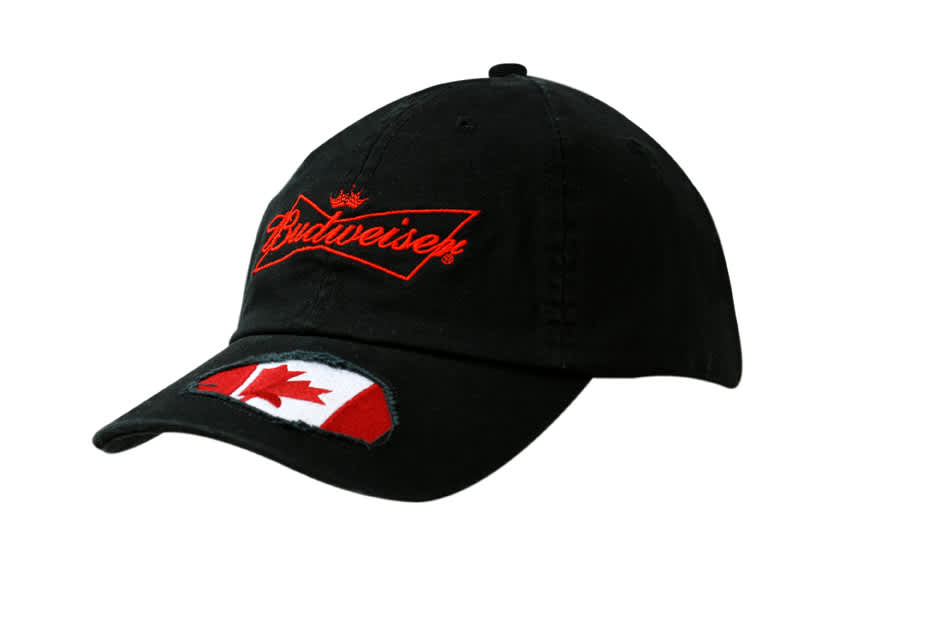Black cap featuring a frayed applique on the peak and a logo on the front.