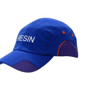 A blue cap with purple fabric inserts and piping on the crown and peak, featuring a logo.