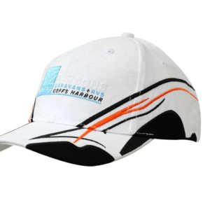 A white cap featuring fabric inserts and embroidery on the crown and peak, with orange and black accents.