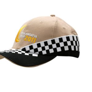 A beige cap with a black peak, featuring check embroidery and a logo. It's a stylish headwear option.
