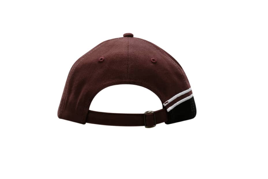 A maroon cap featuring a black peak and a white striped design, with an adjustable strap at the back.