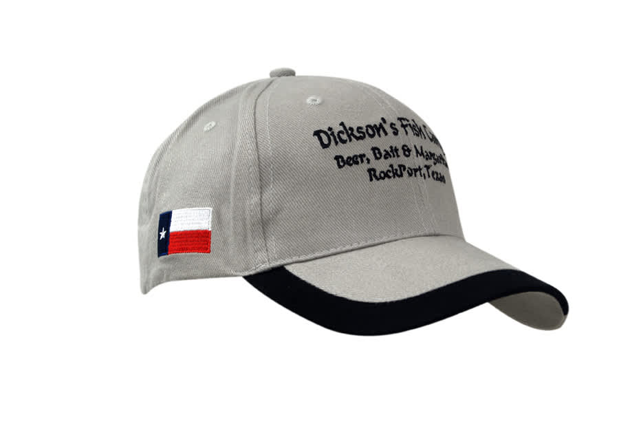 A grey brushed heavy cotton cap with a peak indent and a Texas flag on the side, featuring text.