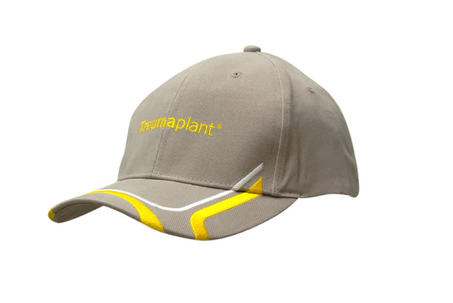 A beige cap featuring a peak, embroidered design, and a logo, with yellow and grey detailing.