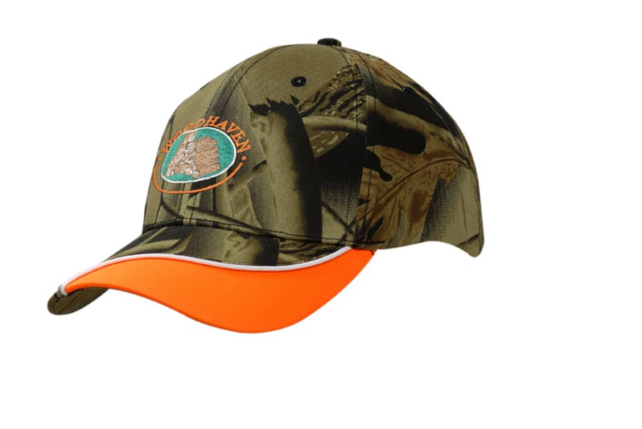 Leaf camouflage cap featuring a peak indent and piping, primarily in green with an orange brim and an emblem.